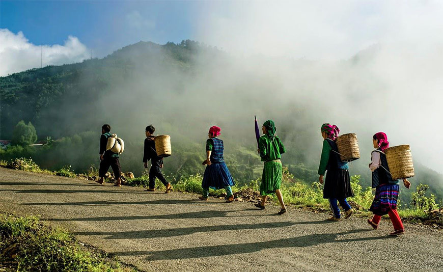 A group of Hmong people on their way to the market