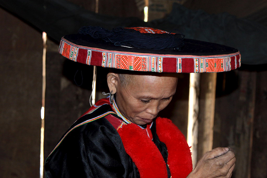 Traditional dress of a Red Dao woman
